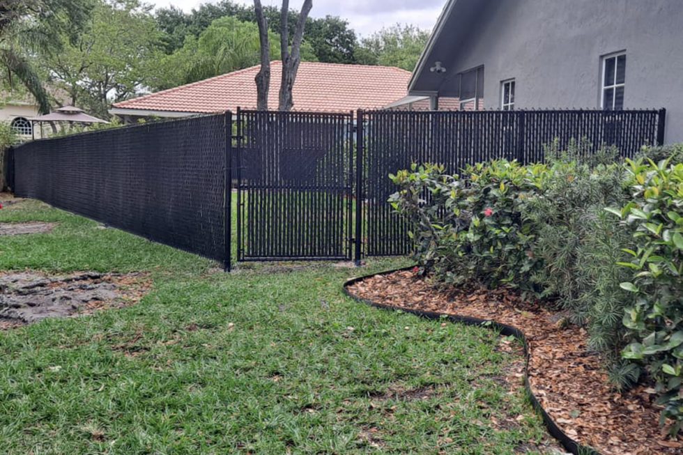 Black Vinyl Chain Link Fence & Gate with Black Slats Coconut Creek