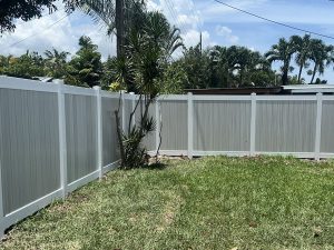 6' Vertical White Frame PVC Privacy Fence with Weathered Aspen Pickets in Fort Lauderdale