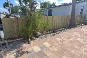 Board-on-board wood privacy fence installed by Exclusive Custom Fence & Repairs at a residential property in Oakland Park, Broward County, Florida.